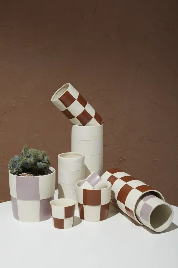 Brown checkerboard ceramic vase set in multiple sizes with lavender accents