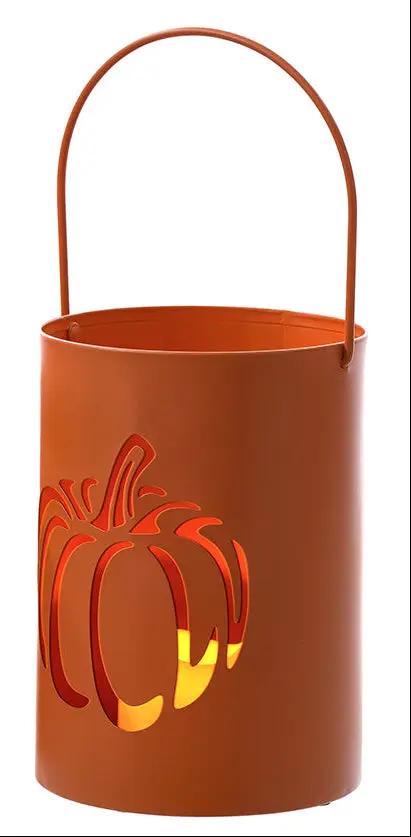Metal cutout pumpkin can candle holder in orange by Special T