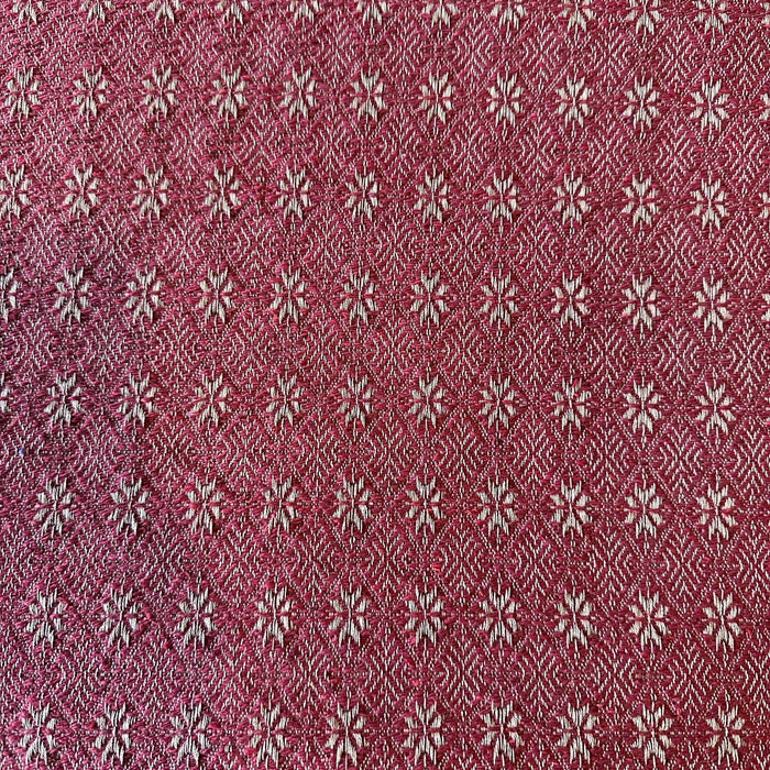 Red swatch of a woven colonial pattern of  small star-like shapes - Primitive Star Quilt Shop
