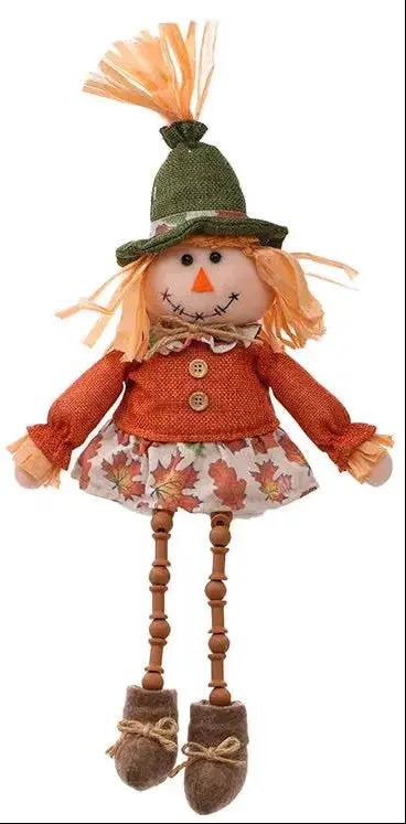 Plush scarecrow shelf sitter, 2-pack, 15-inch tall, by Special T; orange top and leaf-pattern skirt.