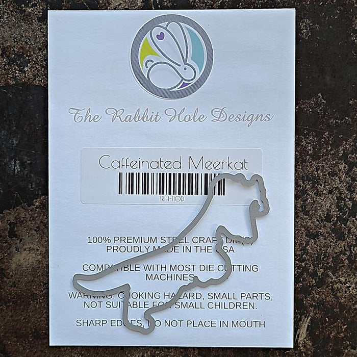 The Rabbit Hole Designs - Die - Caffeinated - Meerkat. The Rabbit Hole Designs dies are made of durable 100% steel. Usable in nearly every machine on the market! Use on cardstock, felt, fabric or shrink plastic. You can use wafer thin dies to cut, stencil, emboss and create! Made in the USA. Available at embellish Away located in Bowmanville Ontario Canada.