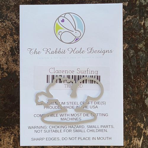 The Rabbit Hole Designs - Die Set - Clarence Surfing. Deeply etched, clear photopolymer stamps for precise placement. Made in USA. Available at Embellish Away located in Bowmanville Ontario Canada.