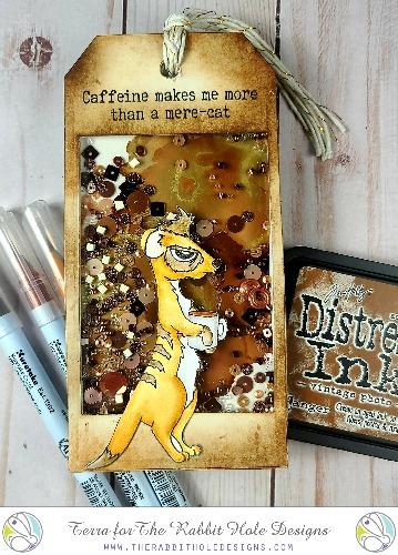 The Rabbit Hole Designs - Stamp Set - Caffeinated - Meerkat - 3x4. Deeply etched, clear photopolymer stamps for precise placement. Made in USA. Available at Embellish Away located in Bowmanville Ontario Canada. Shaker Tag design by Terra.